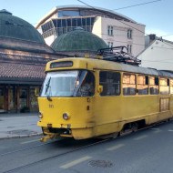 An old yellow tram in Sarajevo