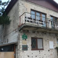 The war-damaged building that conceals the entrance to the Sarajevo tunnel