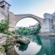 The old bridge in Mostar, a high, single arch, stone bridge