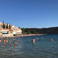 Neum seaside with people swimming in the sea