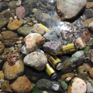 Some beers chilling in one of Bosnia's rivers