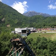 The collapsed bridge by the river near the Museum of the Battle for the Wounded at Neretva