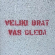 Graffiti on a wall that says Big brother is watching you in Bosnian